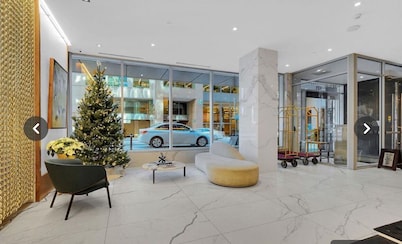 Walk to marketplace from secure condo backing onto Sparks St. (parking spot!)