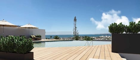 Inomhuspool, 2 utomhuspooler, parasoller och solstolar