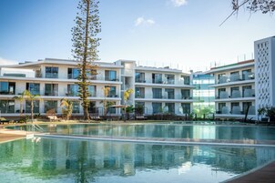 2 outdoor pools, open 8:00 AM to 8:00 PM, pool umbrellas, sun loungers
