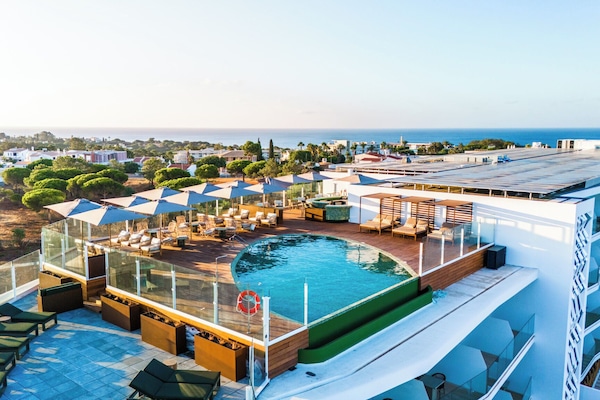 2 outdoor pools, open 8:00 AM to 8:00 PM, pool umbrellas, sun loungers