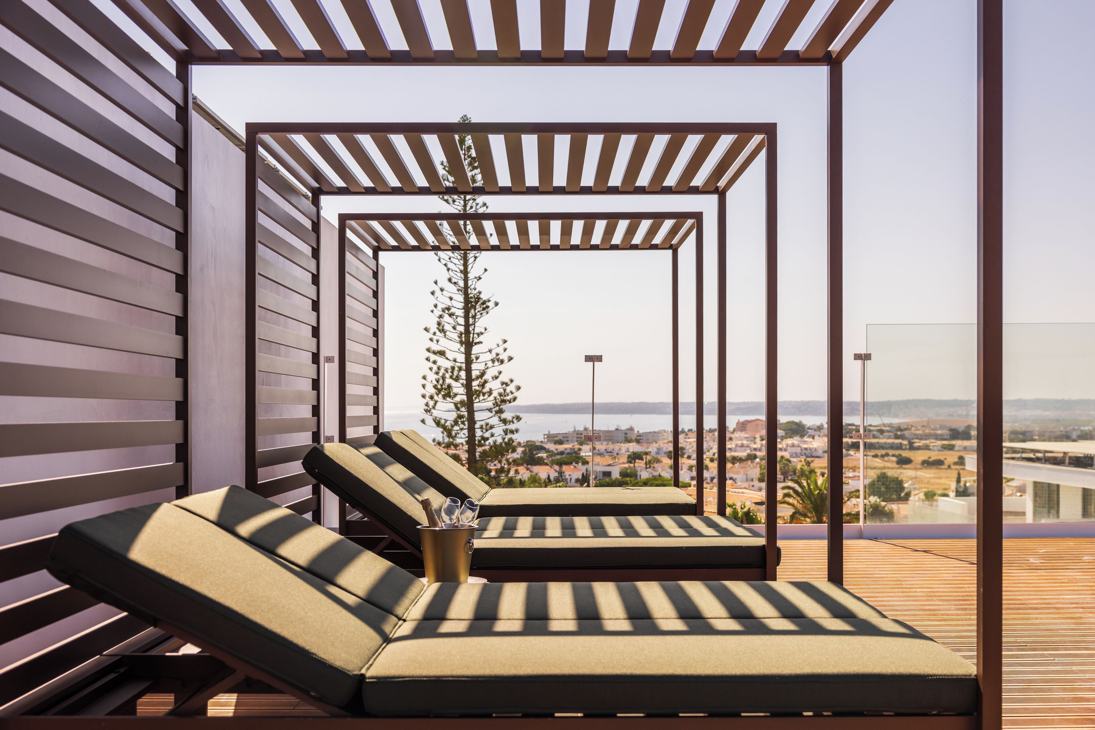 2 outdoor pools, open 8:00 AM to 8:00 PM, pool umbrellas, sun loungers