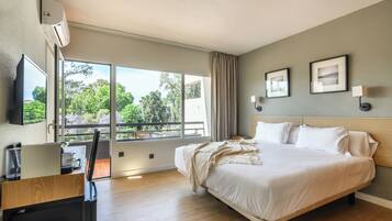 Double Room, Balcony, Garden View | Minibar, laptop workspace, blackout curtains, free cots/infant beds