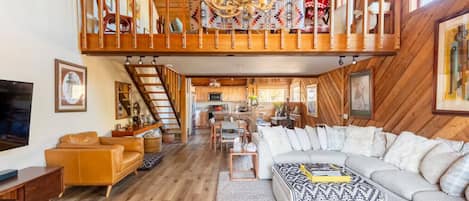 Smart TV, fireplace, books, stereo