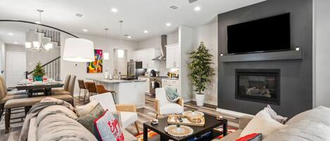 Smart TV, fireplace, books