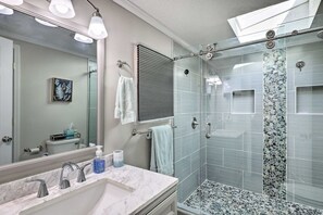 Shower, hair dryer, towels, toilet paper