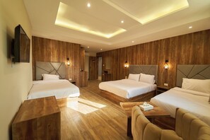 Deluxe Quadruple Room | Egyptian cotton sheets, premium bedding, down comforters, pillowtop beds