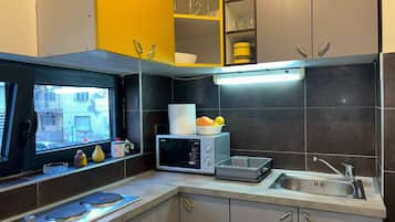 Appartement Standard, vue ville | Cuisine privée | Machine à expresso, cafetière/bouilloire, bouilloire électrique