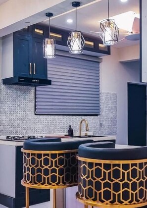 Fridge, microwave, oven, stovetop - Gold Lux 2-bedroom Unit @The O's Apartments (Takoradi)