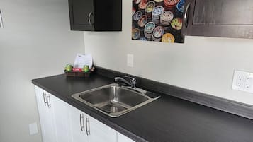 Microwave, stovetop, coffee/tea maker, electric kettle