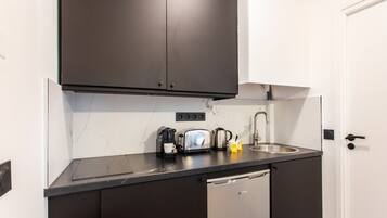 Fridge, microwave, stovetop, coffee/tea maker