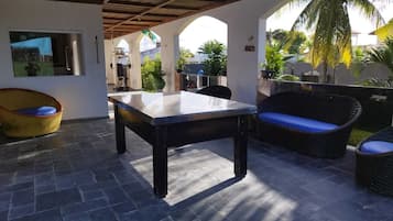 Casa Confort | Área de sala de estar | Televisión de pantalla plana