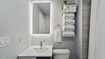 Hair dryer, towels, soap, shampoo