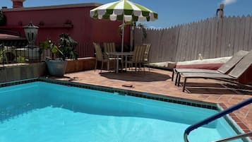 Outdoor pool, pool umbrellas, pool loungers