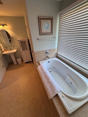 Shower, jetted bath, towels, soap