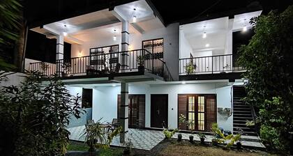 Villa 51 ,Spacious 4-bedroom apartment with WiFi, AC in enchanting Hikkaduwa