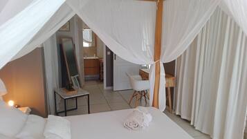 1 habitación, tabla de planchar con plancha, wifi gratis y ropa de cama