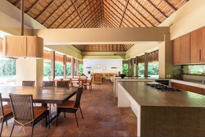 Deluxe House, Patio, Garden View | Living area