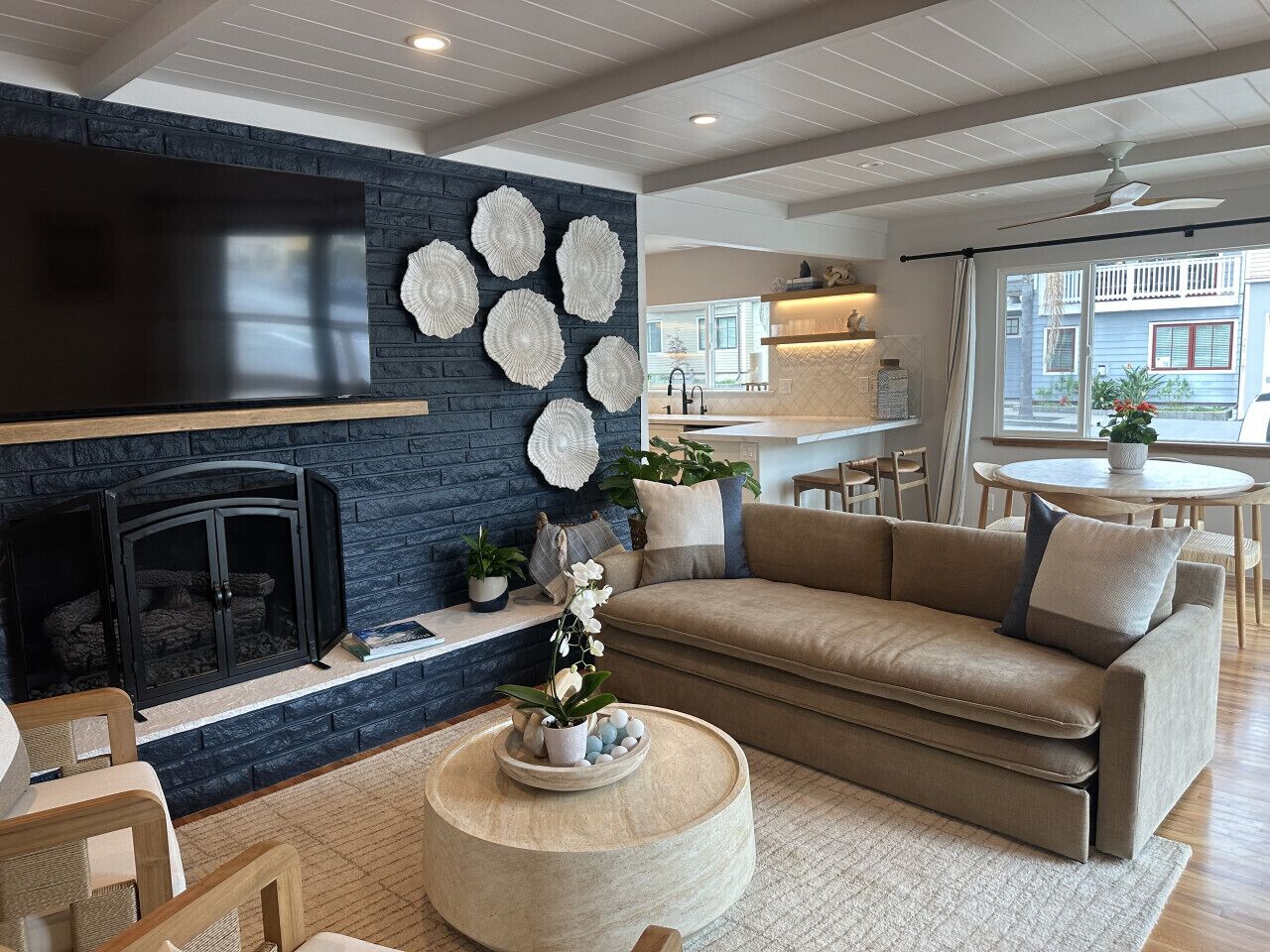 TV, fireplace, books