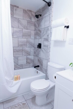 Hair dryer, towels, toilet paper