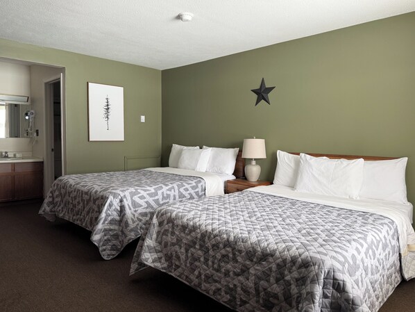 Standard Room, 2 Queen Beds, Non Smoking | Laptop workspace, blackout curtains, iron/ironing board, free WiFi - The Trail Inn - Newberry, MI - 13467 M-28 (Newberry)