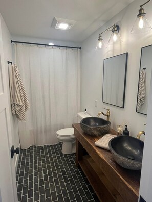 Hair dryer, towels, soap, toilet paper