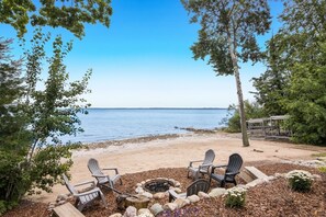 On the beach, sun-loungers, beach towels