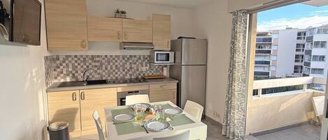 Fridge, microwave, oven, cookware/dishes/utensils
