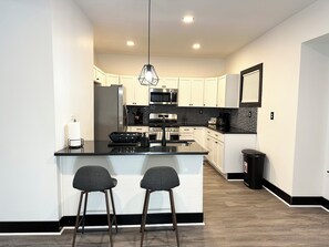 Fridge, microwave, oven, stovetop - Fully Renovated Modern 4-Bedroom, 3-Bath Home Close to Downtown Cleveland (Cleveland)