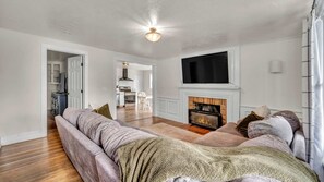 TV, fireplace - Historic 5BR Home with Fire Pit & Outdoor Space (Medina)