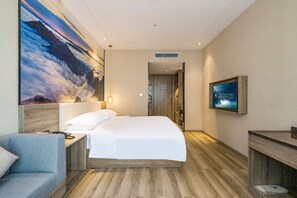 Comfort Room | Blackout curtains, iron/ironing board, free WiFi