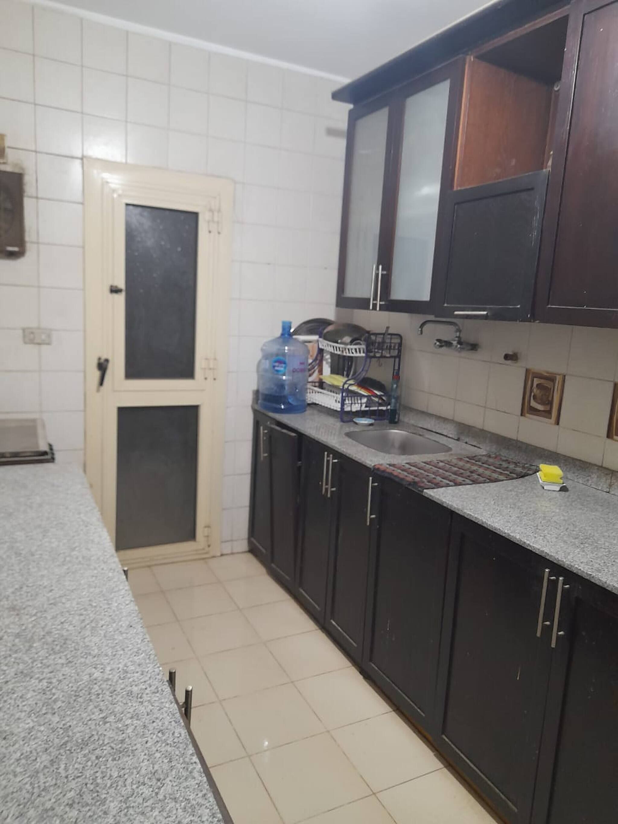 Fridge, dishwasher, dining tables
