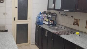 Fridge, dishwasher, dining tables