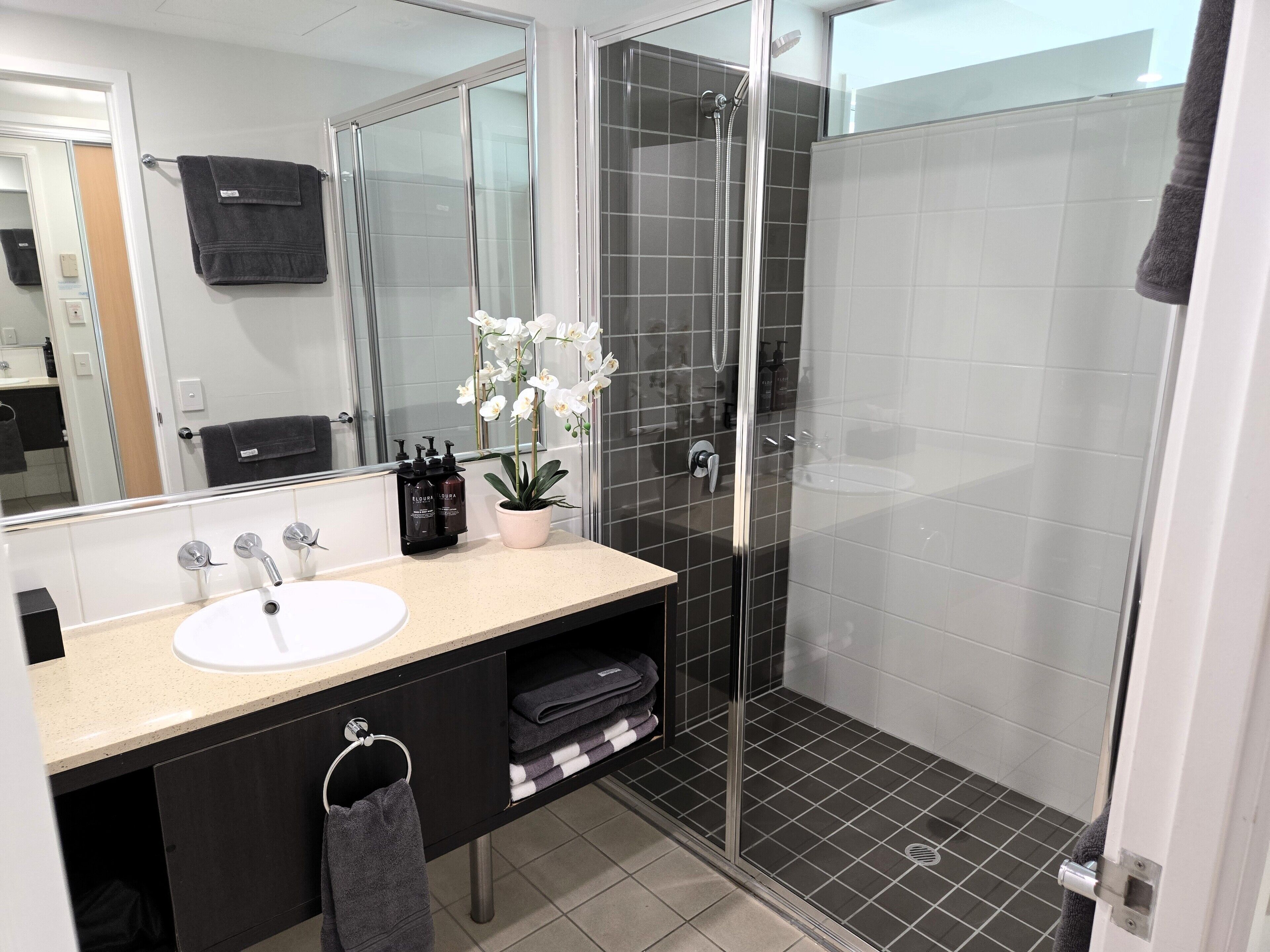 Shower, hair dryer, towels, soap