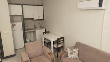 Condo conforto, sacada, vista para a cidade | Área de estar