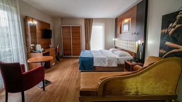 Suite Deluxe | 1 dormitorio, wifi gratis, ropa de cama