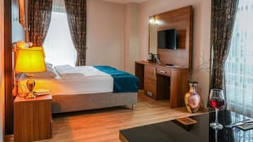 Suíte luxo | Wi-Fi de cortesia, roupa de cama