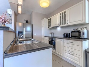 Microwave, oven, dishwasher, high chair