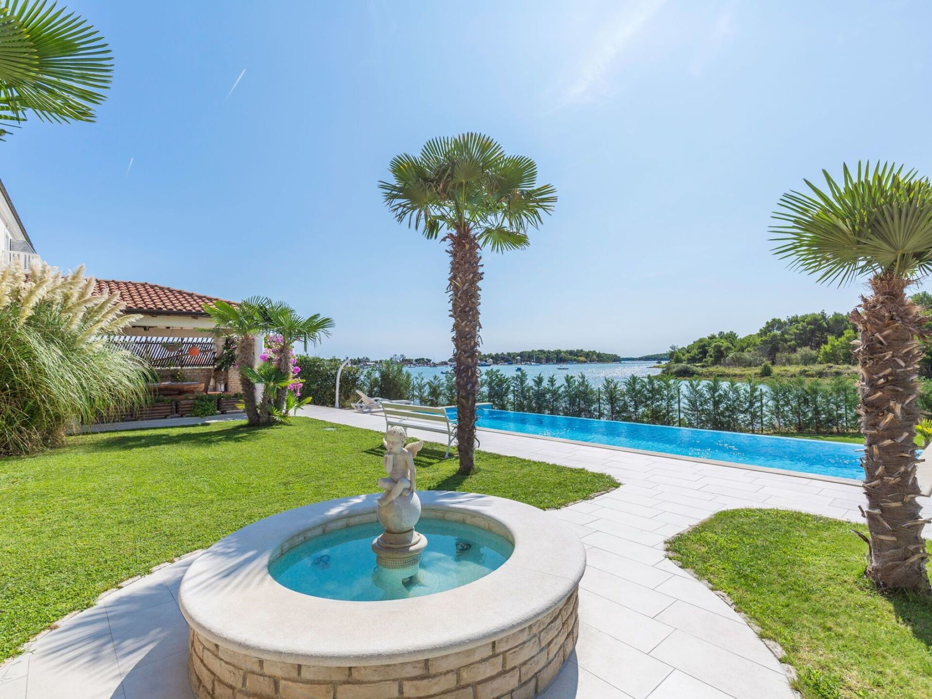 Blue, Tree, Swimming Pool, Resort, Leisure, Eco Hotel, Estate, Shade, Vacation