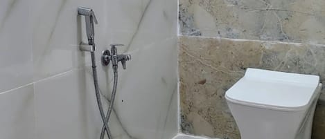 Shower, free toiletries, hair dryer, towels