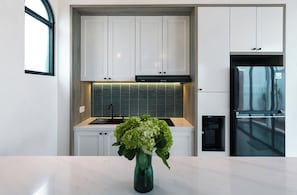Family Triple Room, Garden View | Private kitchenette - Greenforest Anahata 4 Star Hotel (Canggu)