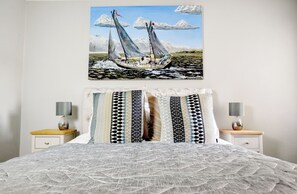 3 habitaciones, tabla de planchar con plancha y cuna de viaje 
