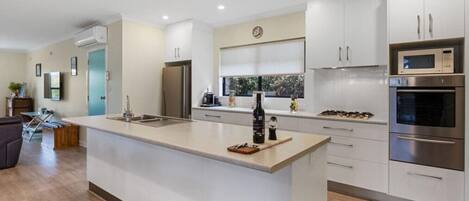 Fridge, oven, stovetop, cookware/dishes/utensils