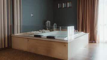 Deluxe Suite, Pool View | In-room safe, desk, laptop workspace, blackout drapes