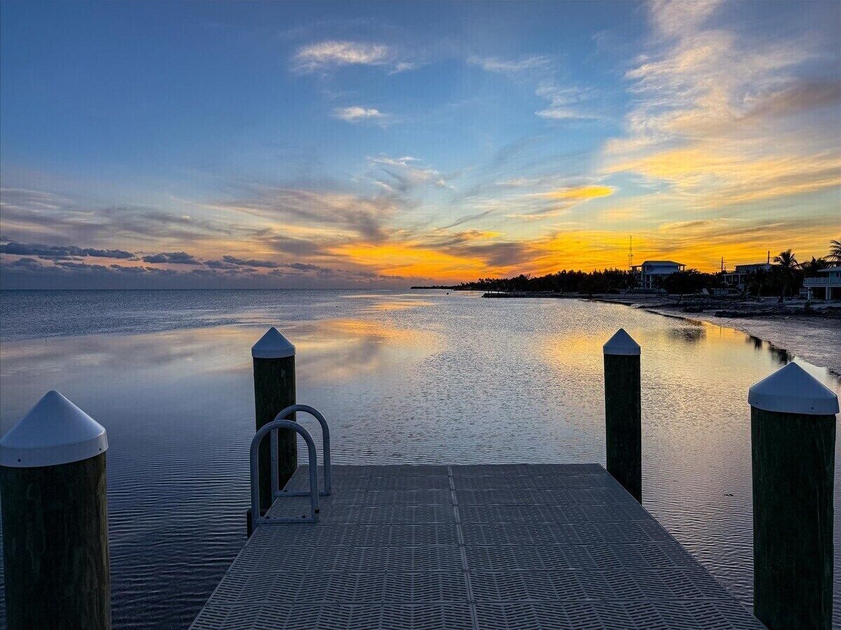 Enjoy unforgettable sunsets from the private dock of this Marathon waterfront vacation rental with ocean access.