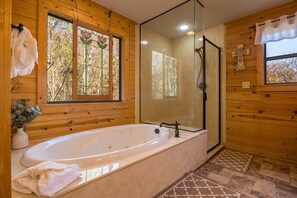 Shower, jetted tub, towels