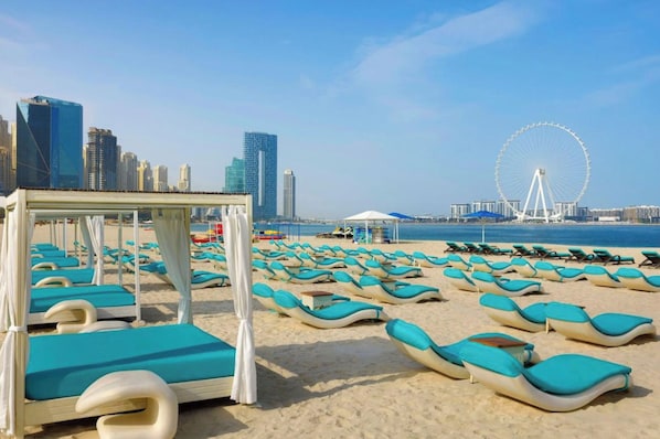 Sun-loungers, beach towels
