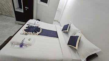 Egyptian cotton sheets, premium bedding, down duvets, memory-foam beds