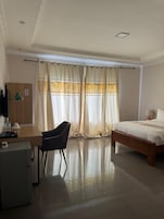 In-room safe, desk, laptop workspace, iron/ironing board