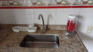 Shower, towels, soap, toilet paper