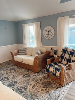 Living area - Cozy Lakeside Retreat with Beach Access, Scenic Views & Endless Amenities (Spirit Lake)